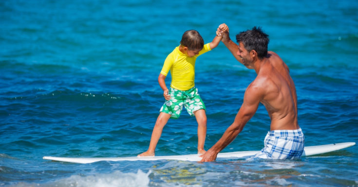 Photo of Child Taking Surf Lessons