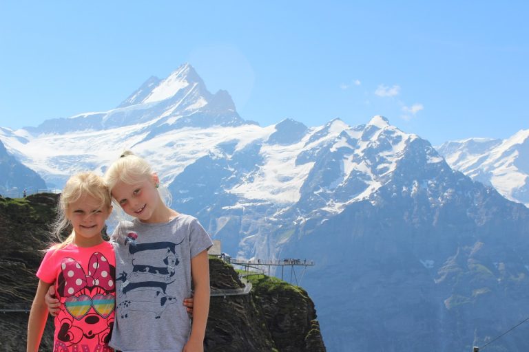 Extended travel with kids is not for the meek of heart! Here are 12 things we've learned that help us stay sane when traveling with our young children.