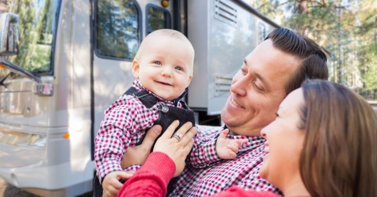 SafetyWing Review - picture of young family in front of RV