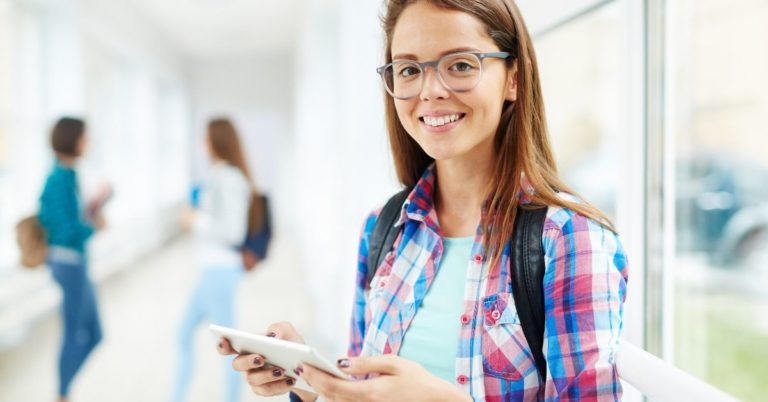 The Best College Advice to Give Your Kids - picture of young student with tablet