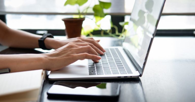 Tips for Freelancers - picture of hands typing on laptop