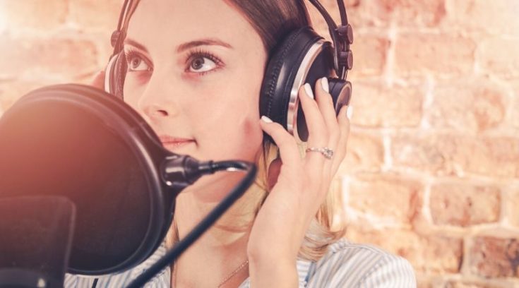 image of woman at microphone