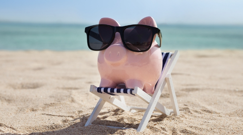 what is a high-yield savings account - photo of pig on beach with sunglasses